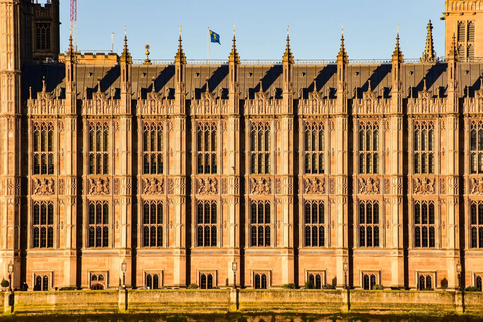 Close-up view of Westminster Palace's intricate Gothic architecture in London, UK.