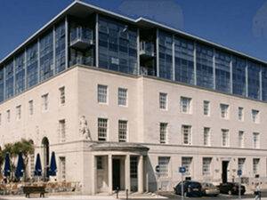 Exterior view of a contemporary apartment complex in Plymouth, expertly managed for residents' comfort and convenience